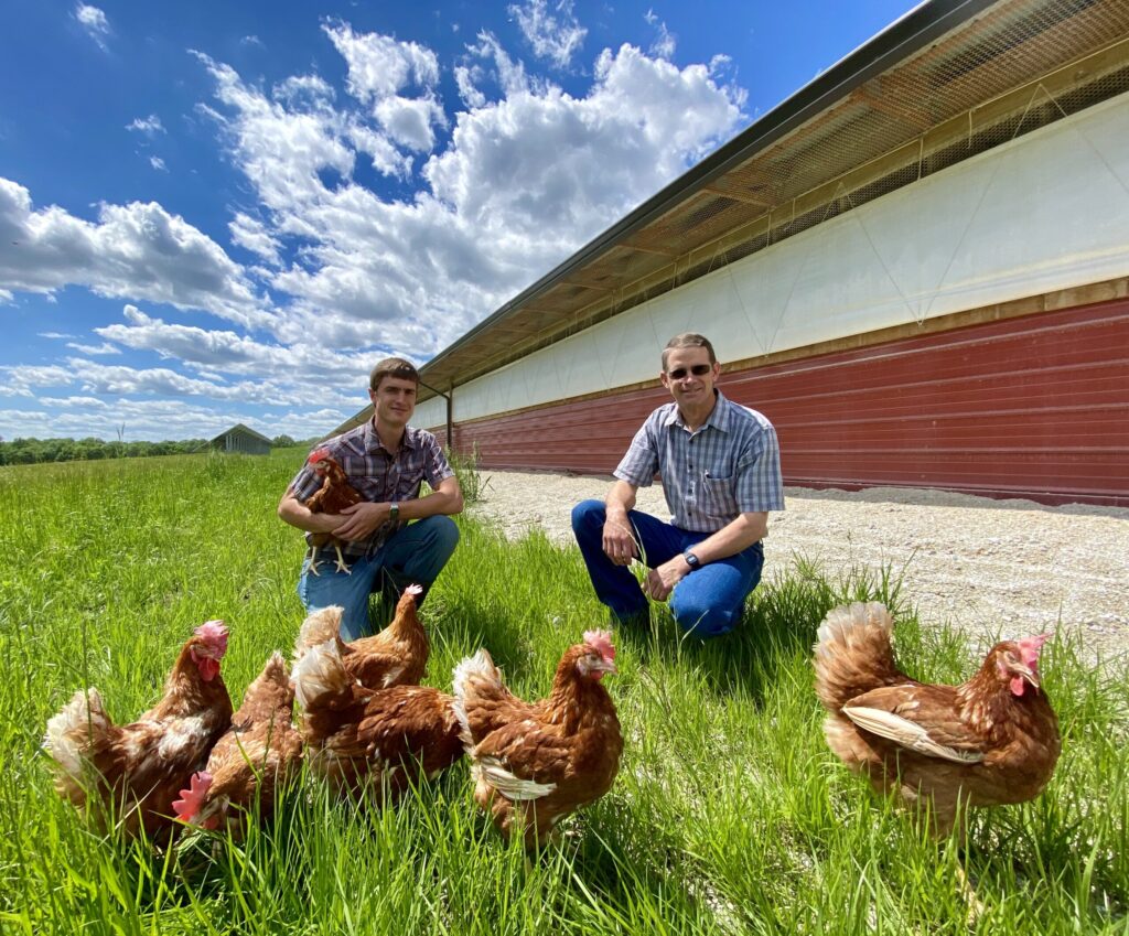 Farmers with chickens