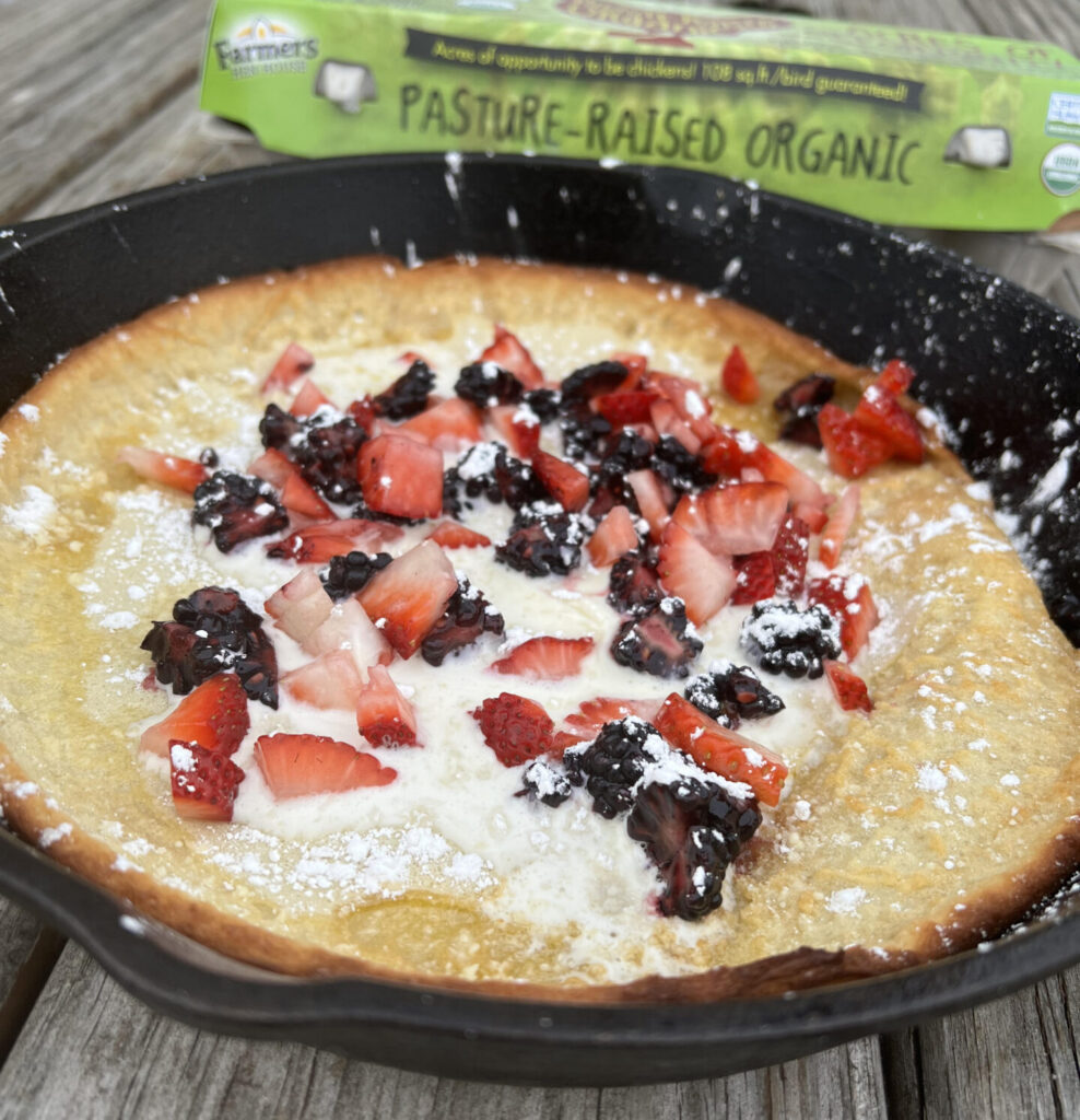 Dutch baby pancake in a cast iron pan